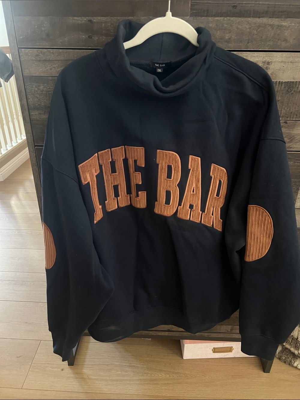 The Bar Navy Blue Turtleneck Sweatshirt with Brown Appliqué